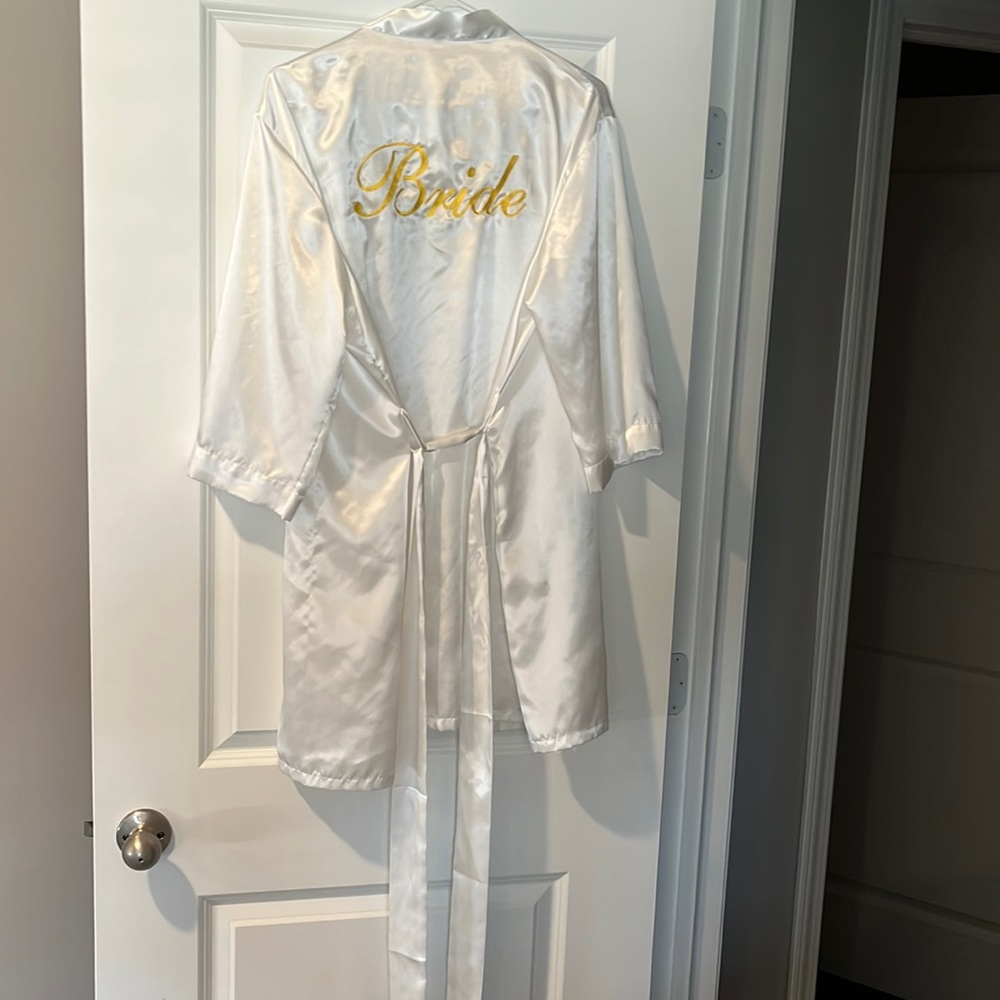 Like new, white and gold lettering “Bride” robe, great condition!